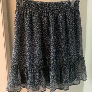 This is a blue skirt with white flowers